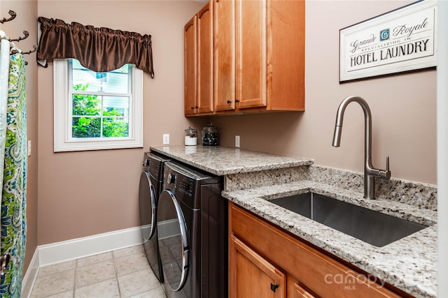 122 Sleepy Cove Trl, Mooresville, NC 28117 - laundry room featuring independent washer and dryer, baseboards, and cabinet space