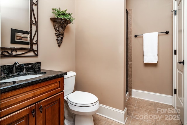 122 Sleepy Cove Trl, Mooresville, NC 28117 - bathroom with tile patterned floors, toilet, baseboards, vanity, and a shower with shower door