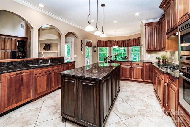 122 Sleepy Cove Trl, Mooresville, NC 28117 - kitchen featuring decorative backsplash, dark stone counters, ornamental molding, appliances with stainless steel finishes, and light tile patterned floors