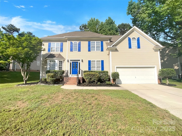 10319 Willingham Rd, Huntersville, NC 28078 - colonial house with an attached garage, concrete driveway, and a front yard