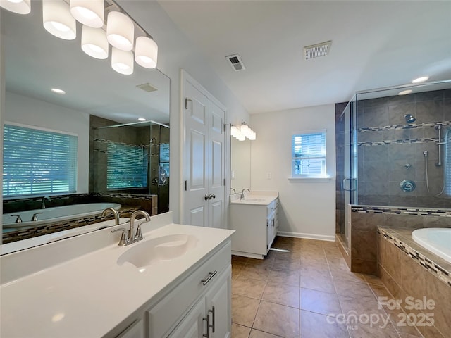 10319 Willingham Rd, Huntersville, NC 28078 - full bath with two vanities, a shower stall, tile patterned flooring, a garden tub, and recessed lighting