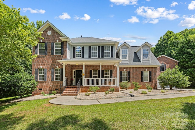 220 Glenville Dr, Fort Mill, SC 29715 - colonial inspired home featuring covered porch, brick siding, and a front lawn