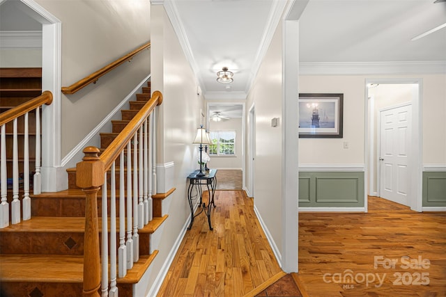 220 Glenville Dr, Fort Mill, SC 29715 - corridor with wood finished floors, ornamental molding, stairs, and wainscoting