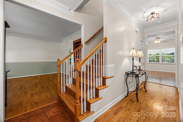 220 Glenville Dr, Fort Mill, SC 29715 - stairway with wood-type flooring, ornamental molding, and ceiling fan