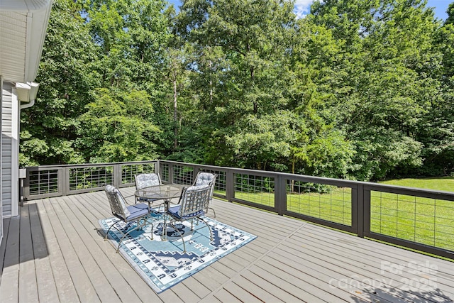 220 Glenville Dr, Fort Mill, SC 29715 - wooden deck featuring outdoor dining space and a lawn