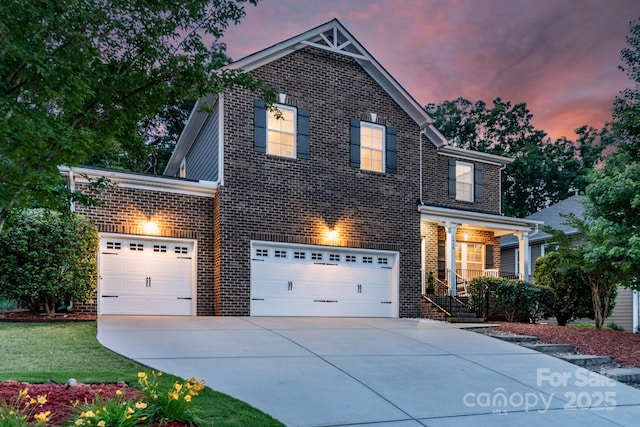 1919 Madeira Cir, Waxhaw, NC 28173 - traditional-style home featuring concrete driveway, brick siding, and a garage