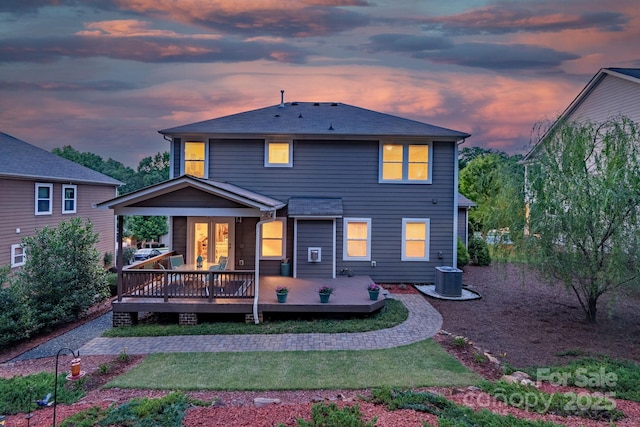 1919 Madeira Cir, Waxhaw, NC 28173 - back of property featuring a wooden deck, central air condition unit, and a yard