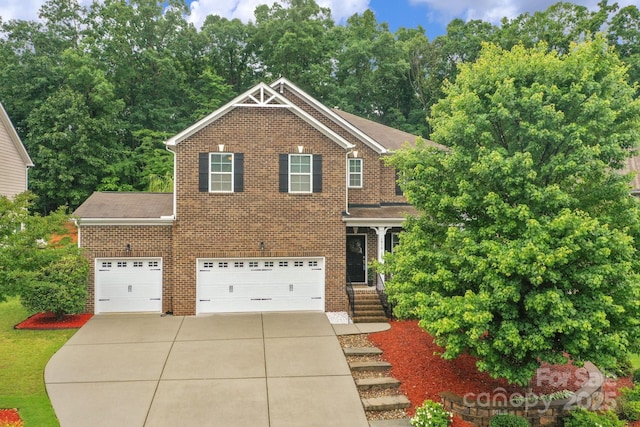 1919 Madeira Cir, Waxhaw, NC 28173 - view of front of home with brick siding, driveway, and a garage