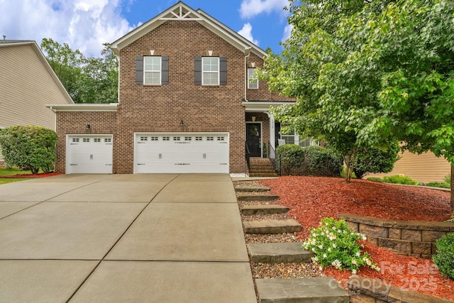 1919 Madeira Cir, Waxhaw, NC 28173 - view of front facade with concrete driveway, brick siding, and a garage