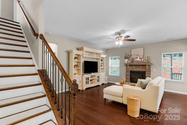 1919 Madeira Cir, Waxhaw, NC 28173 - living room with wood finished floors, ceiling fan, baseboards, and a fireplace
