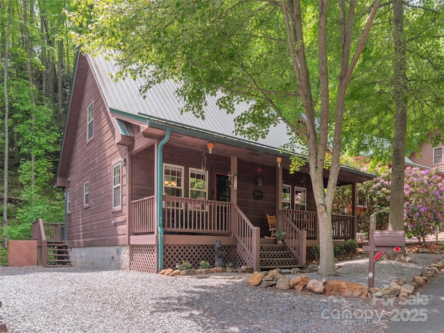 41 Trapper Ln, Waynesville, NC 28785 - chalet / cabin with covered porch, metal roof, and stairway