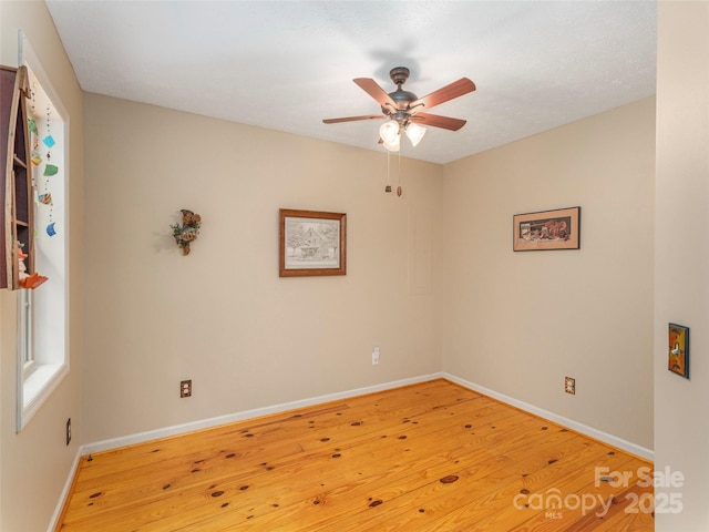 41 Trapper Ln, Waynesville, NC 28785 - empty room with ceiling fan, light wood-type flooring, and baseboards