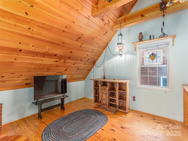 41 Trapper Ln, Waynesville, NC 28785 - living area featuring vaulted ceiling, hardwood / wood-style floors, wooden ceiling, and baseboards