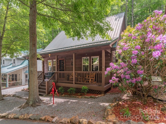41 Trapper Ln, Waynesville, NC 28785 - view of front facade featuring a porch and metal roof