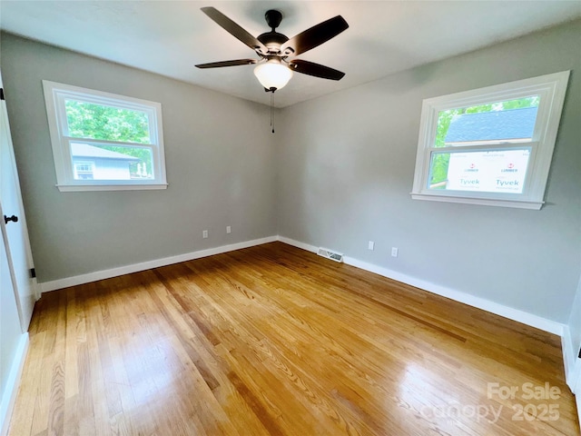188 Johnston Blvd, Asheville, NC 28806 - spare room featuring healthy amount of natural light, light wood finished floors, and baseboards
