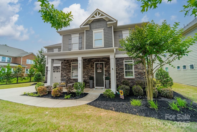 515 Lizzie Ln, Fort Mill, SC 29708 - craftsman-style home with covered porch and stone siding