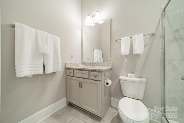 515 Lizzie Ln, Fort Mill, SC 29708 - full bathroom featuring vanity, baseboards, toilet, and a tile shower