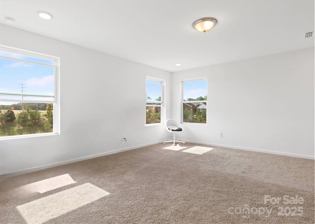 1433 Harleston St, Indian Trail, NC 28079 - carpeted spare room featuring healthy amount of natural light, recessed lighting, and a smoke detector