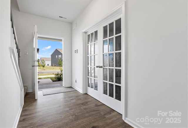 1433 Harleston St, Indian Trail, NC 28079 - doorway to outside featuring dark wood-type flooring