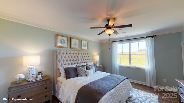 106 Noah Ln, Troutman, NC 28166 - bedroom featuring baseboards, crown molding, dark wood finished floors, and ceiling fan