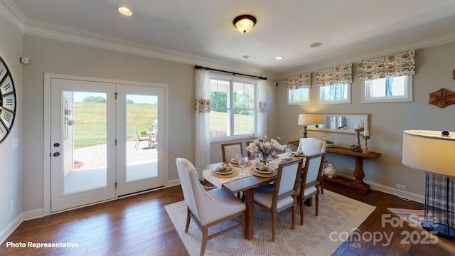 106 Noah Ln, Troutman, NC 28166 - dining area featuring ornamental molding, wood finished floors, baseboards, and recessed lighting