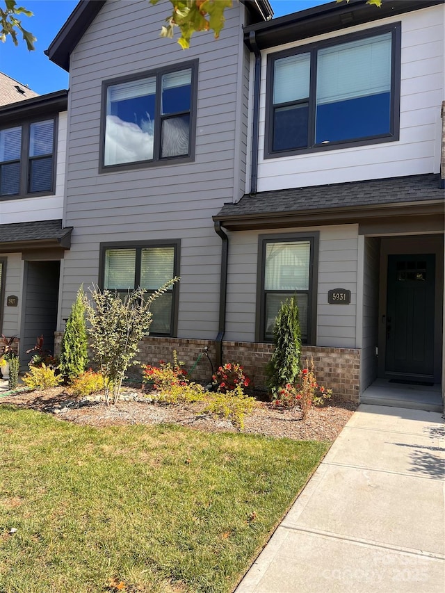 5931 Ardrey Kell Rd, Charlotte, NC 28277 - townhome / multi-family property with brick siding and a front yard