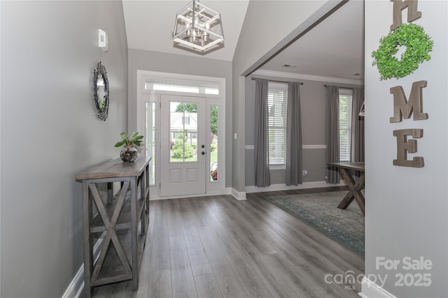 3709 Creek Ridge Dr, Denver, NC 28037 - entryway with wood finished floors, a chandelier, baseboards, crown molding, and lofted ceiling