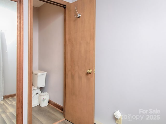 269 Johnson Dairy Rd, Mooresville, NC 28115 - bathroom with wood finished floors, toilet, and baseboards