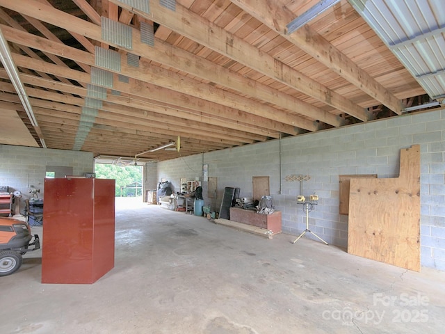 269 Johnson Dairy Rd, Mooresville, NC 28115 - misc room featuring concrete block wall and unfinished concrete floors
