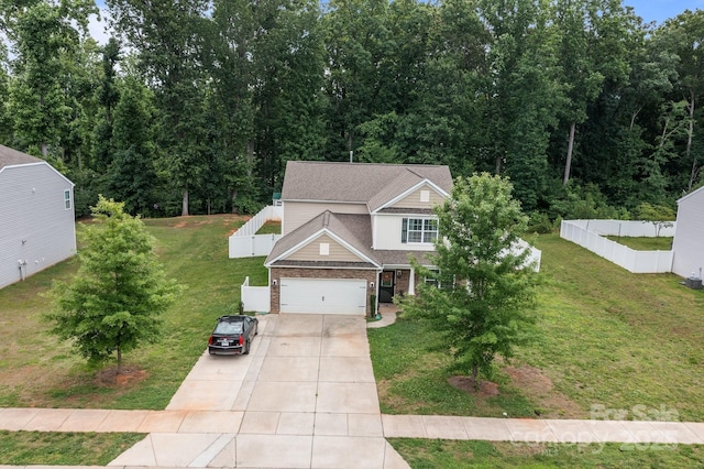 413 Wheat Field Dr, Mount Holly, NC 28120 - view of front of property featuring driveway, an attached garage, and brick siding