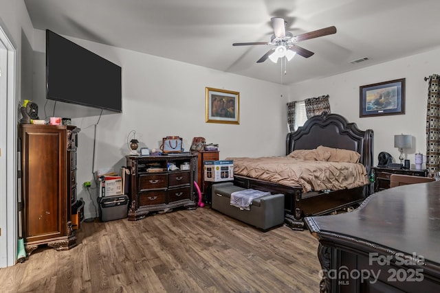413 Wheat Field Dr, Mount Holly, NC 28120 - bedroom with wood finished floors and a ceiling fan