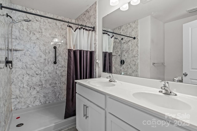 413 Wheat Field Dr, Mount Holly, NC 28120 - bathroom with a shower stall and double vanity