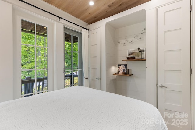 bedroom with access to outside, multiple windows, wooden ceiling, and recessed lighting