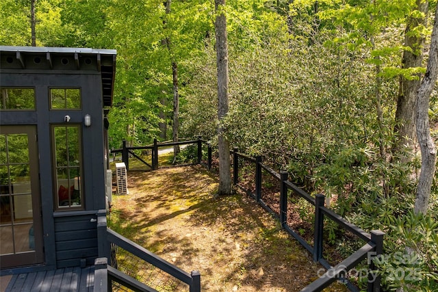 view of yard with a forest view