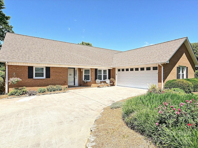 202 Cameron Dr, Kings Mountain, NC 28086 - ranch-style house with brick siding, a shingled roof, a garage, and driveway