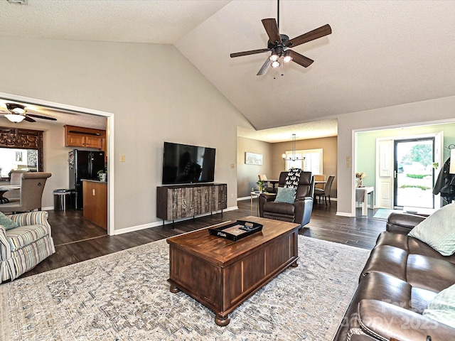 202 Cameron Dr, Kings Mountain, NC 28086 - living area with ceiling fan, a chandelier, high vaulted ceiling, dark wood-style floors, and baseboards