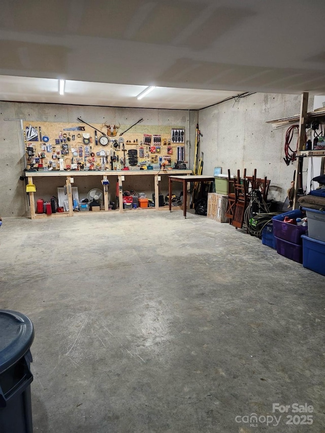 garage featuring a workshop area