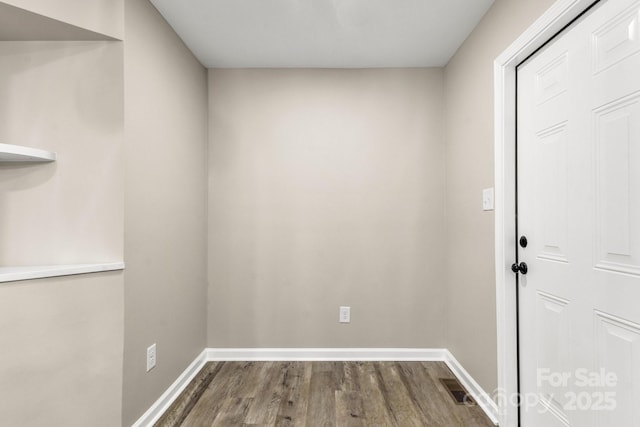 316 Fulton St, Kings Mountain, NC 28086 - spare room with dark wood-type flooring and baseboards