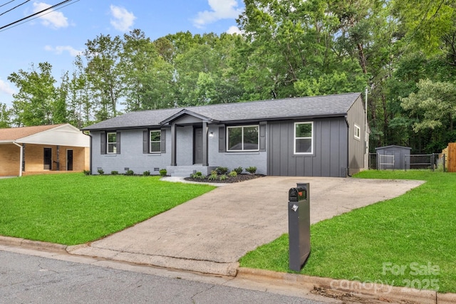 316 Fulton St, Kings Mountain, NC 28086 - ranch-style house with board and batten siding, driveway, roof with shingles, and brick siding