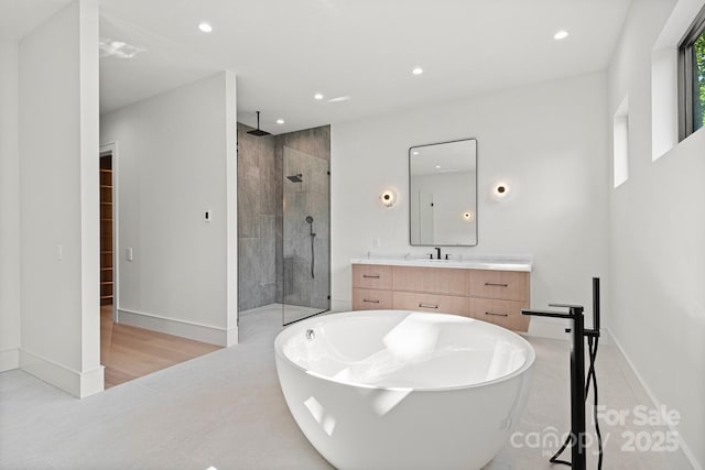 78 Running Creek Trl Unit 93, Arden, NC 28704 - full bath with walk in shower, a freestanding tub, recessed lighting, vanity, and baseboards