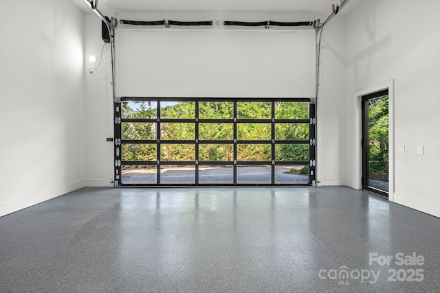 78 Running Creek Trl Unit 93, Arden, NC 28704 - empty room featuring a high ceiling, plenty of natural light, speckle patterned floor, and baseboards