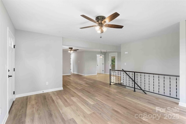 428 Jackson Rd, Fletcher, NC 28732 - empty room with a ceiling fan, wood finished floors, and baseboards