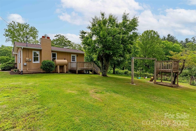 428 Jackson Rd, Fletcher, NC 28732 - view of grassy yard featuring a deck