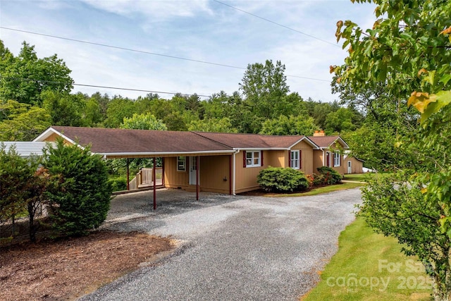428 Jackson Rd, Fletcher, NC 28732 - ranch-style house with driveway, an attached carport, and a chimney