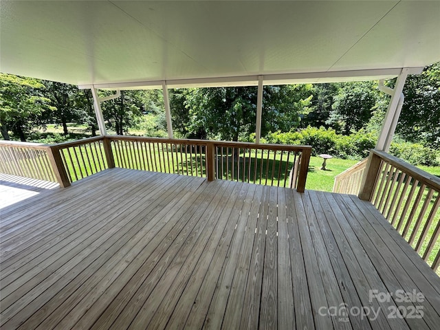 428 Jackson Rd, Fletcher, NC 28732 - wooden deck featuring a yard and view of scattered trees