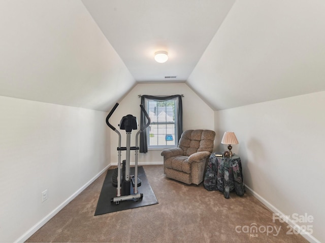 1564 Trippett St NW, Concord, NC 28027 - exercise area featuring carpet floors, vaulted ceiling, and baseboards