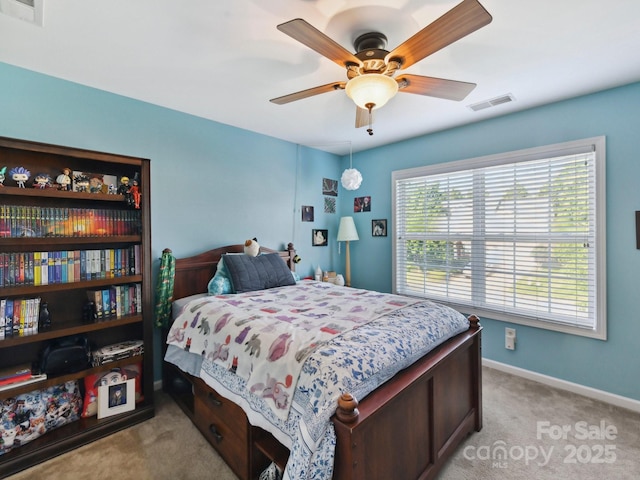 1564 Trippett St NW, Concord, NC 28027 - bedroom with light carpet, baseboards, and ceiling fan