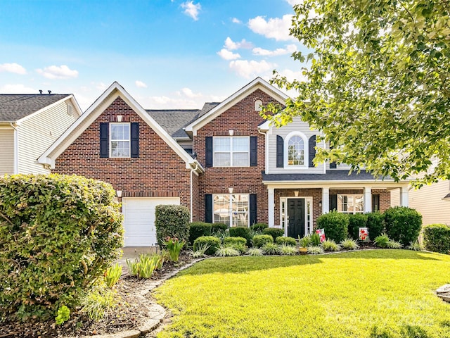 1564 Trippett St NW, Concord, NC 28027 - traditional-style home with brick siding, a garage, a front lawn, and driveway