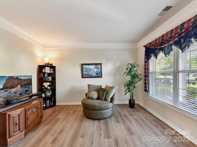 1564 Trippett St NW, Concord, NC 28027 - sitting room with crown molding, light wood-type flooring, and baseboards