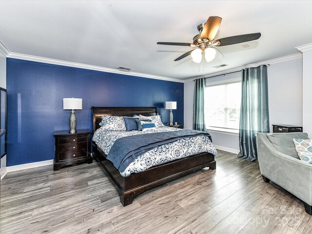 10800 Alabaster Dr, Davidson, NC 28036 - bedroom featuring crown molding, baseboards, wood finished floors, and ceiling fan